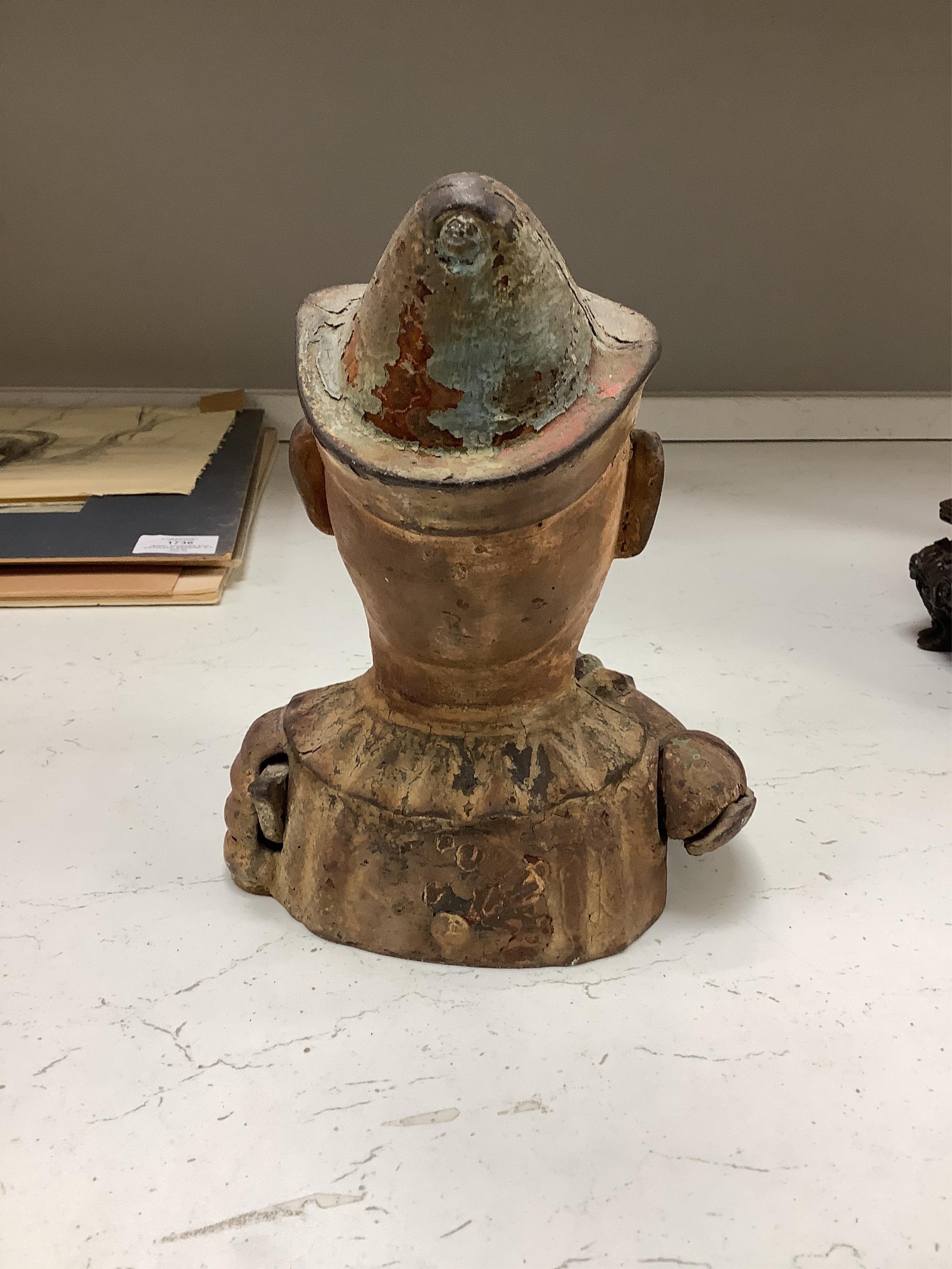 Six various metalware money boxes to include to jolly money banks, standing bear and one in the form of a crown. Condition - fair with general wear